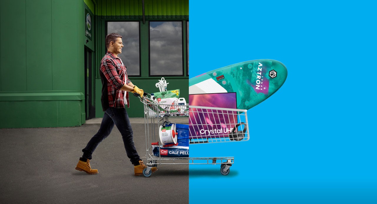 Farmer with shopping trolley full of rewards redemption items