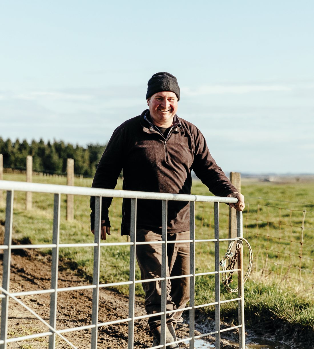 Farmer opening gate