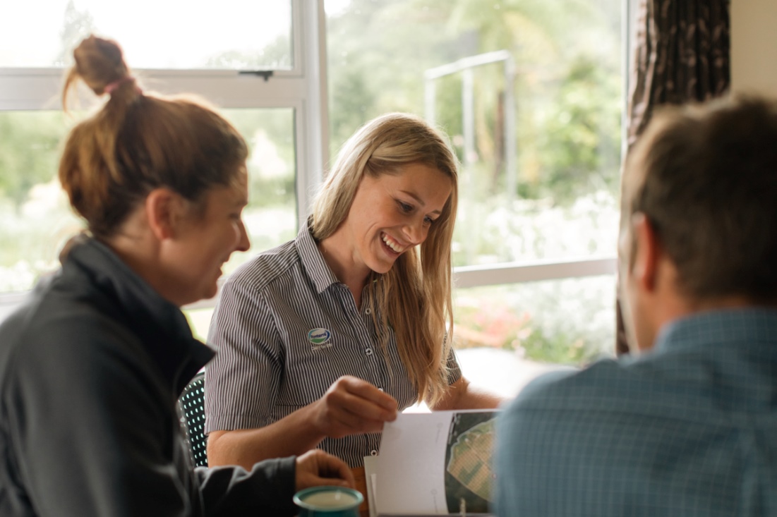 Farmer and Farm Source team laughing