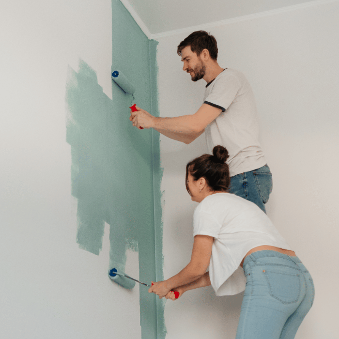 People painting wall