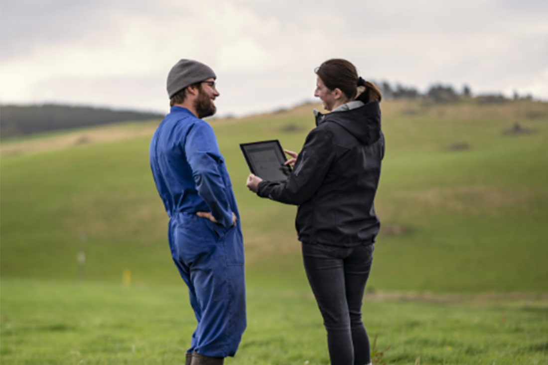 Farm Source staff supporting farmer